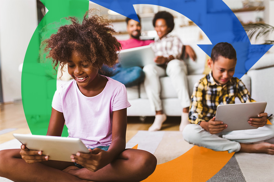 Children sit on floor each using a tablet and smiling, with Conexon icon for thumbnail.