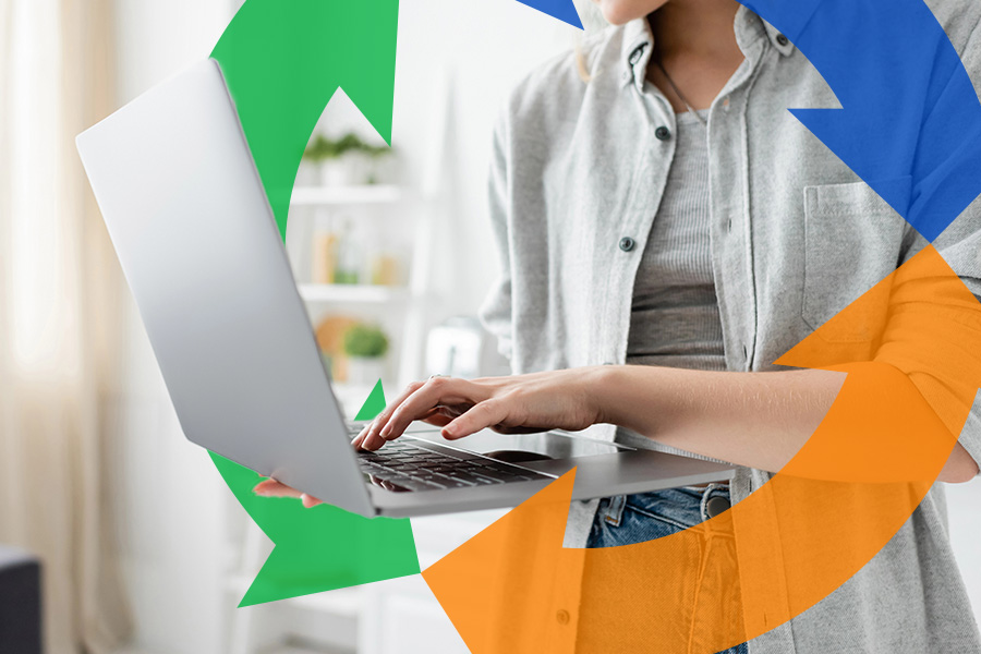 Woman holds her laptop while standing and typing. Conexon icon goes around her arm for thumbnail.